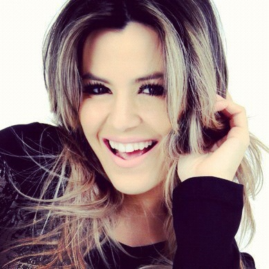 (Tania Oliveira, apresentadora de TV)